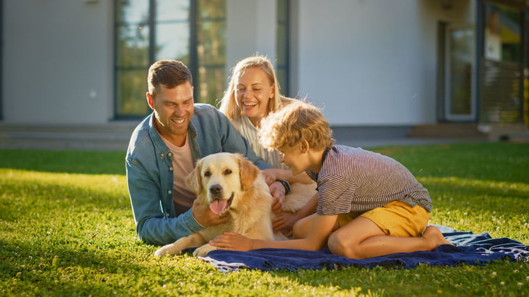 Family with Dog on the Lawn