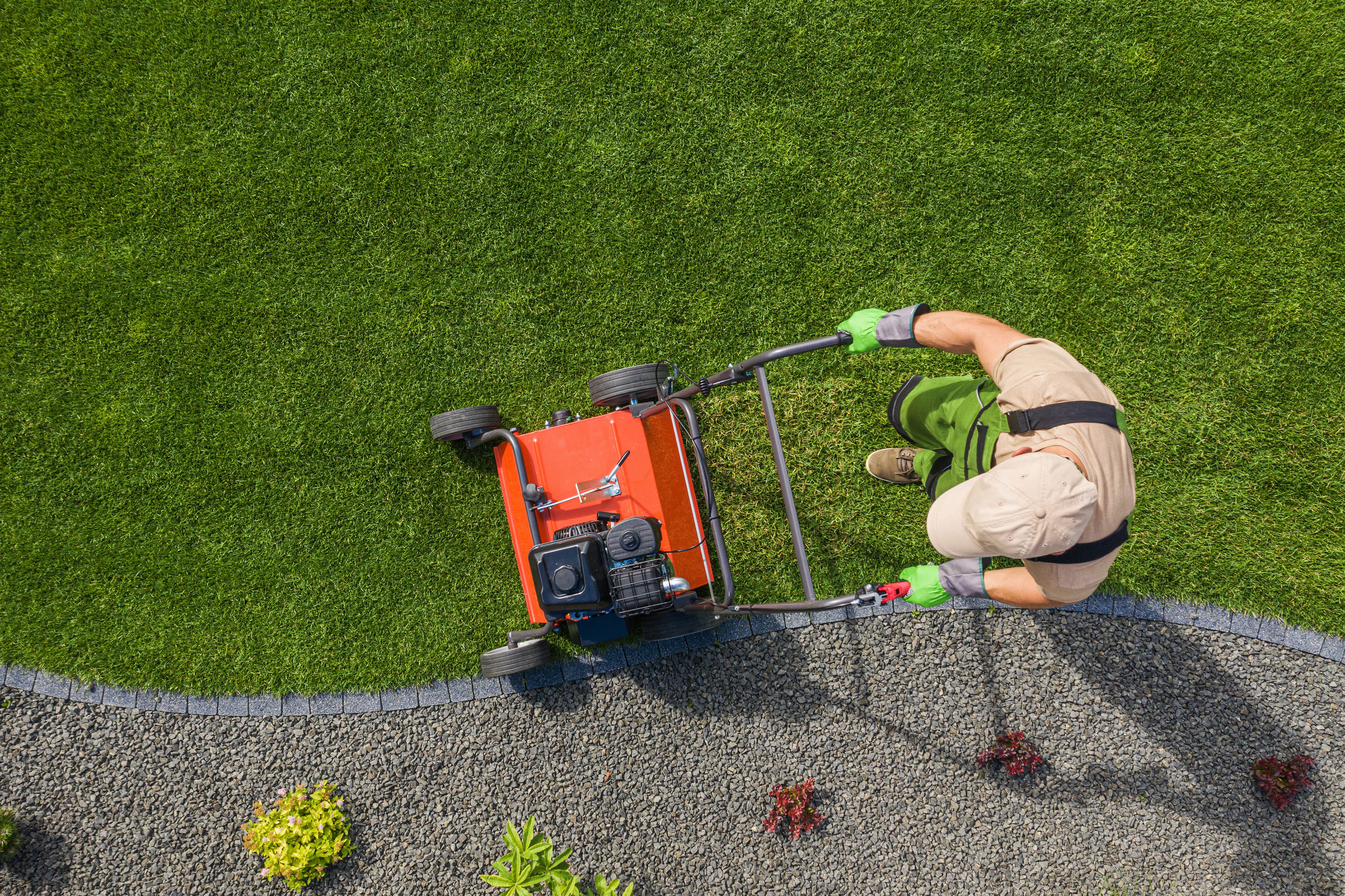 Landscaper Performing Aeration Service